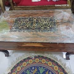 centre table with antique golden design  on top with mirror covering