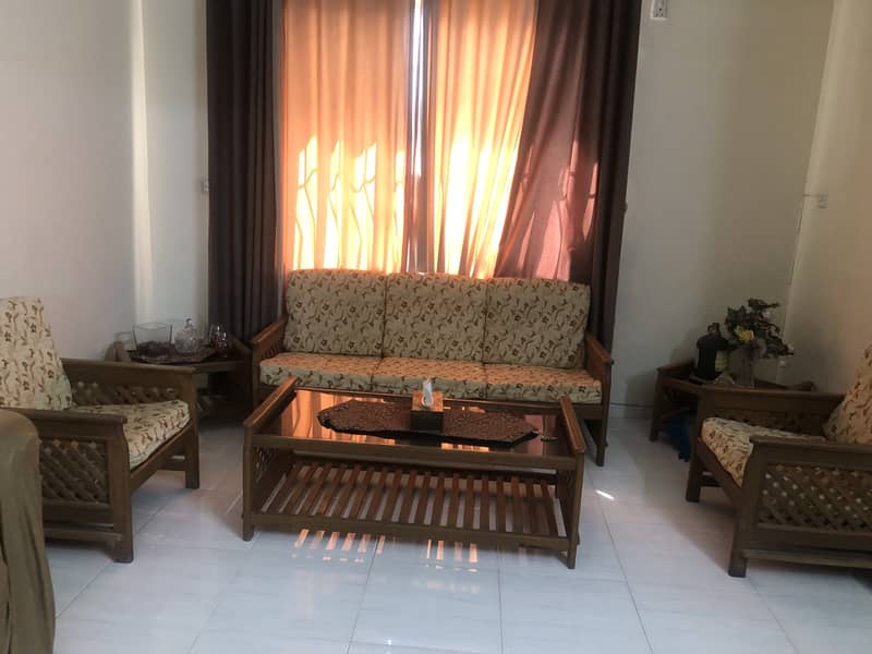 5 seater wooden sofa set + three center tables 3