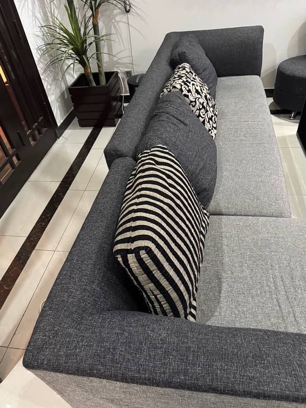 L shaped black and grey sofa 2