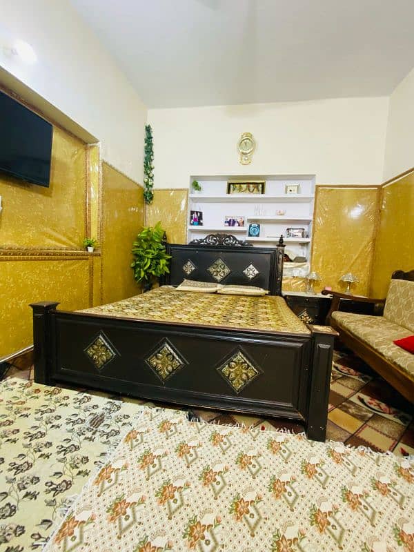 BED FOR SALE WITH TWO SIDE TABLES . WITHOUT MATRESS. . . CONDITION 6/10 0