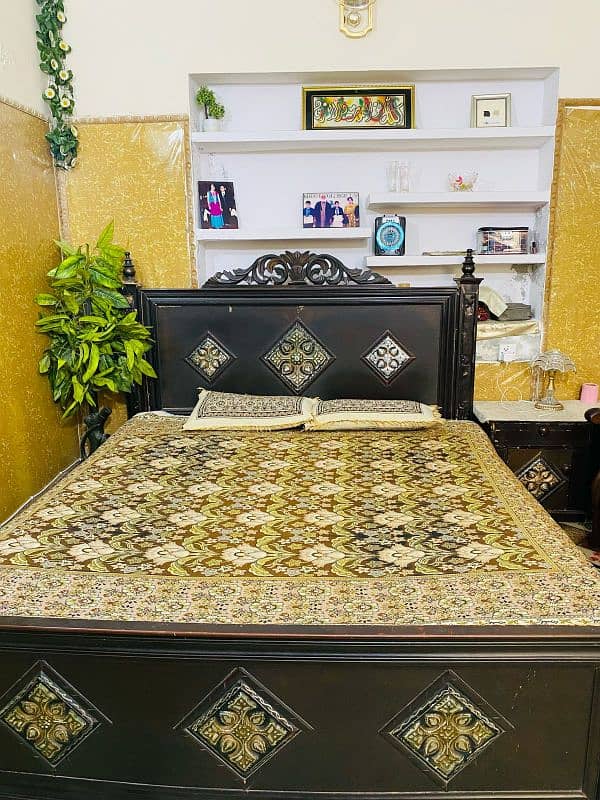 BED FOR SALE WITH TWO SIDE TABLES . WITHOUT MATRESS. . . CONDITION 6/10 1