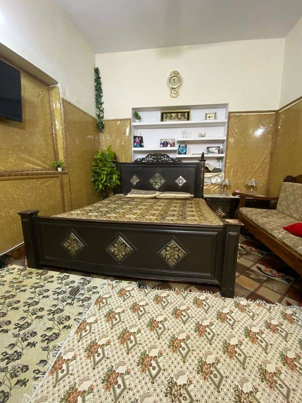 BED FOR SALE WITH TWO SIDE TABLES . WITHOUT MATRESS. . . CONDITION 6/10 3