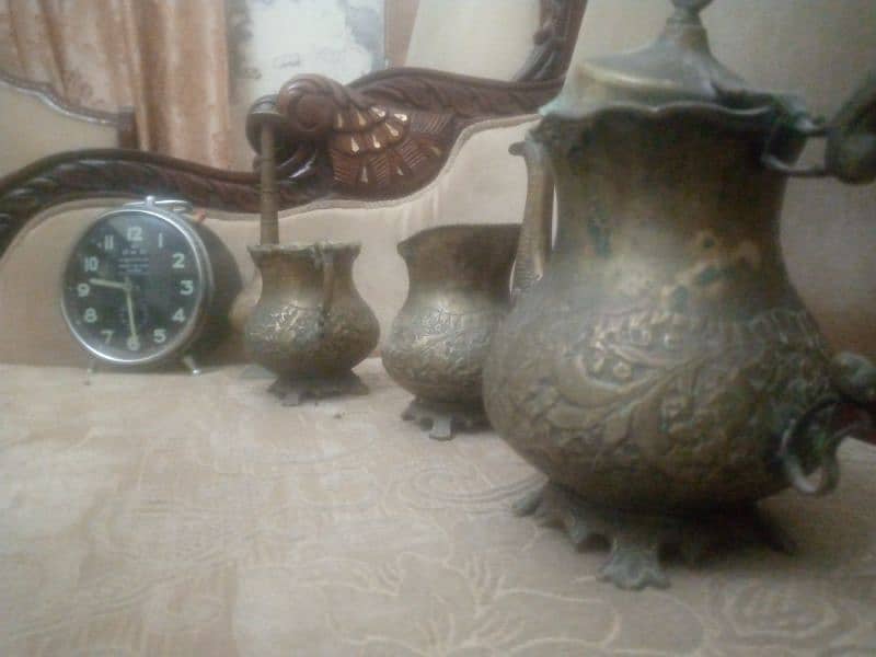 Bross cattle and jars with watch 2