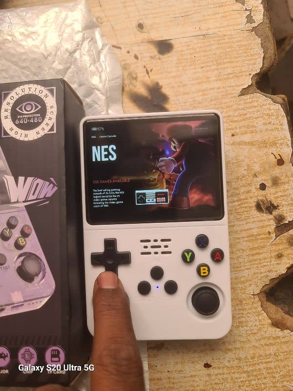 R36S video game console with 15000 games 0