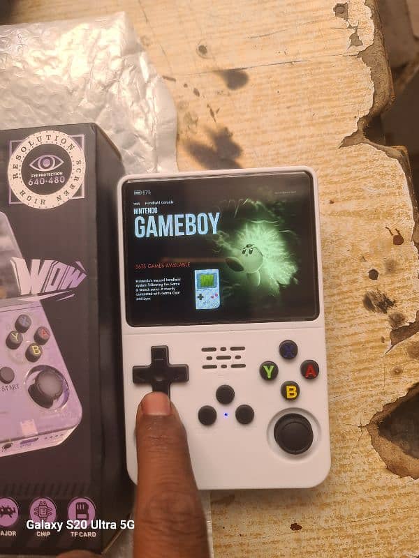 R36S video game console with 15000 games 3