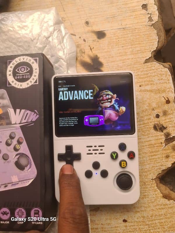 R36S video game console with 15000 games 4