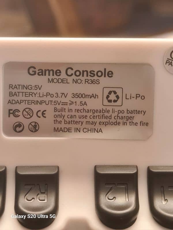 R36S video game console with 15000 games 1