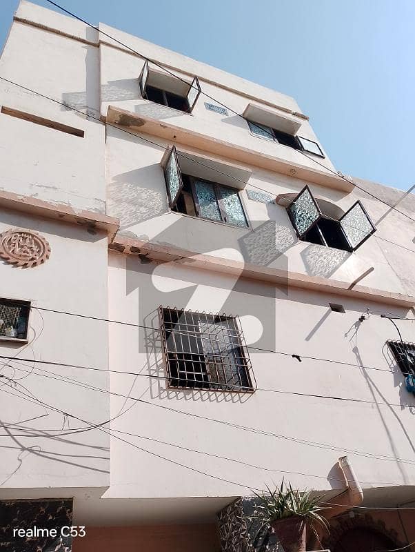 Home for sale 180 SY Ground + 3 RCC Building Rafi Bungalows. Leased , West Open, Corner Rent Value 1.7 Lacs. 13 KE Meters, 3 Gas Meters, 3 Water Tanks. 1