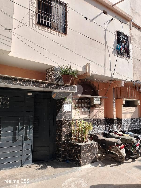 Home for sale 180 SY Ground + 3 RCC Building Rafi Bungalows. Leased , West Open, Corner Rent Value 1.7 Lacs. 13 KE Meters, 3 Gas Meters, 3 Water Tanks. 2
