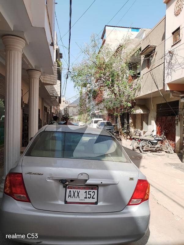 Home for sale 180 SY Ground + 3 RCC Building Rafi Bungalows. Leased , West Open, Corner Rent Value 1.7 Lacs. 13 KE Meters, 3 Gas Meters, 3 Water Tanks. 4