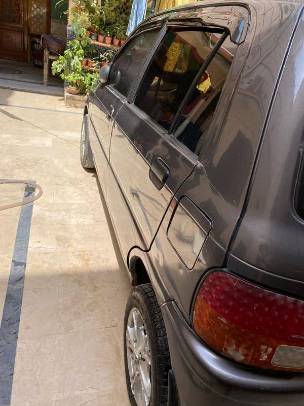I am selling my car cuore converted in 660cc engine 4