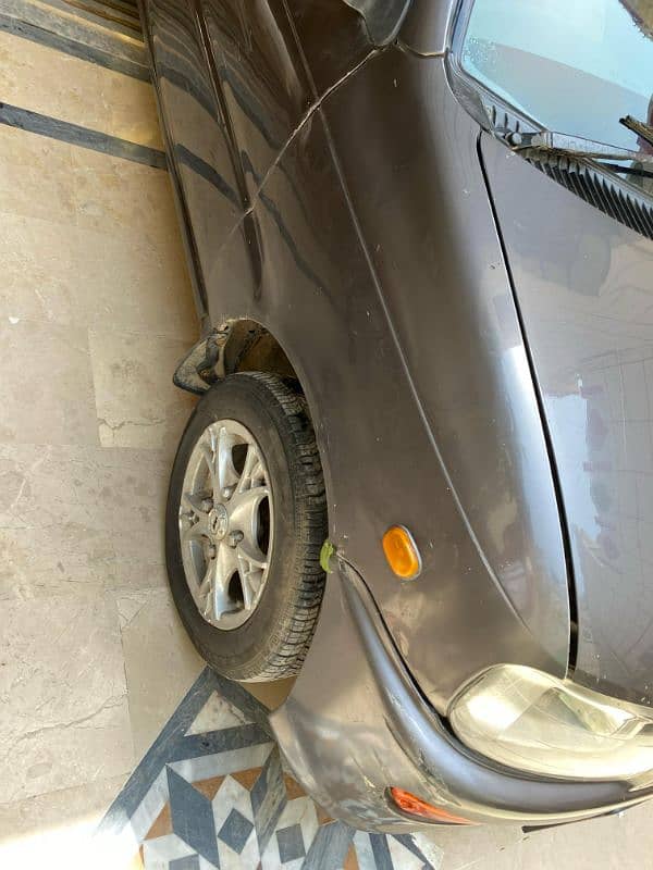 I am selling my car cuore converted in 660cc engine 6