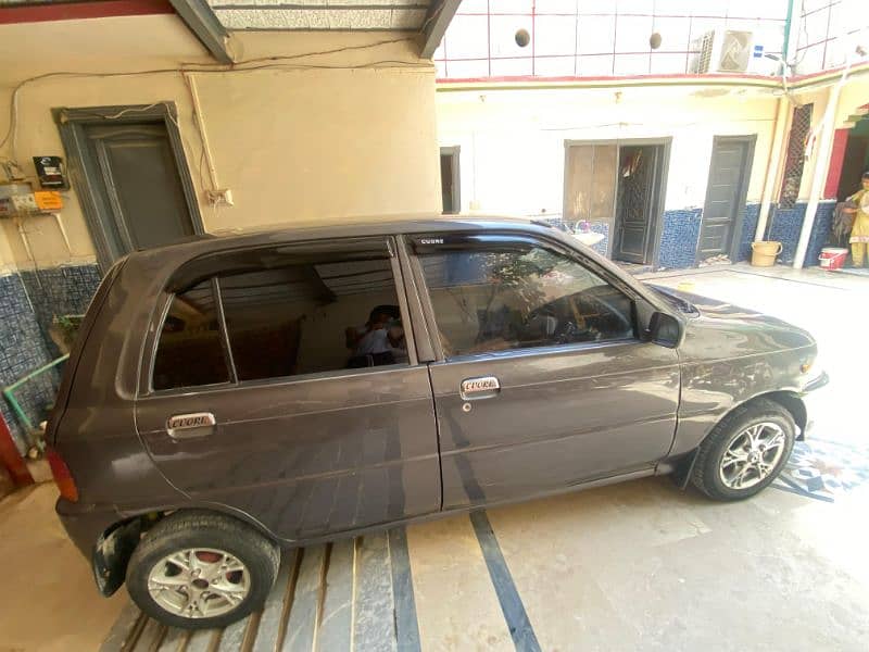 I am selling my car cuore converted in 660cc engine 7