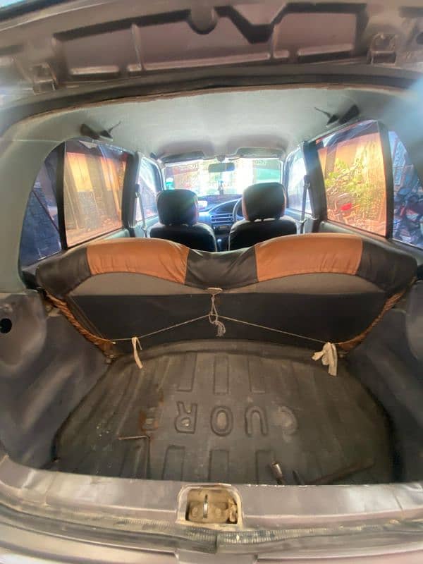 I am selling my car cuore converted in 660cc engine 9