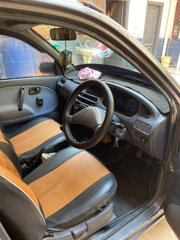 I am selling my car cuore converted in 660cc engine 11