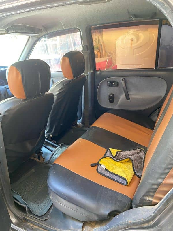 I am selling my car cuore converted in 660cc engine 13