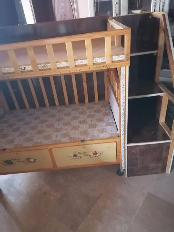 Bed with slider and wall mounted rack 1
