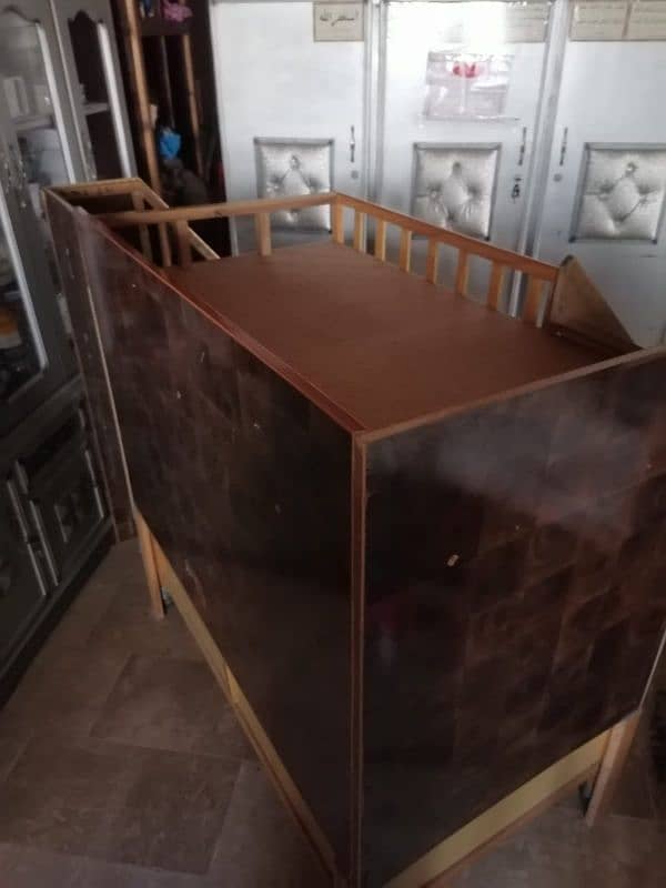Bed with slider and wall mounted rack 2