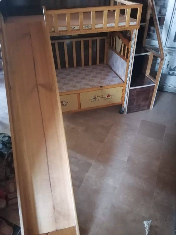 Bed with slider and wall mounted rack 4
