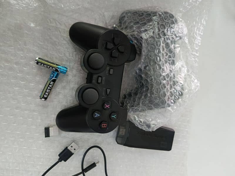 M8 Gamestick lite 4k HD games with wireless controllers 2