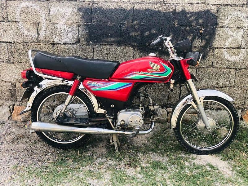 Honda cd  17 model lahore num Biomtric available All documents clear 1