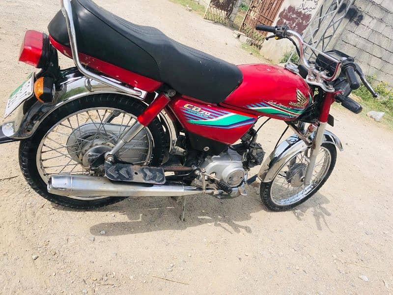 Honda cd  17 model lahore num Biomtric available All documents clear 5
