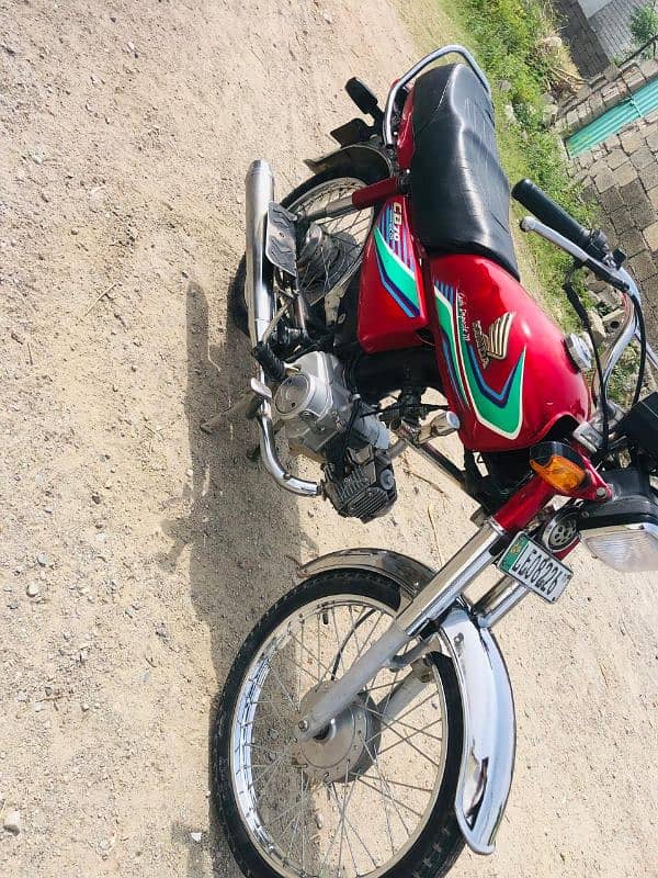 Honda cd  17 model lahore num Biomtric available All documents clear 6