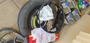 Original Mercedes 213 Jack coupled with spare tyre and triangle