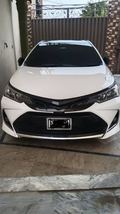 Toyota Corolla Altis Grande White total Genuine
