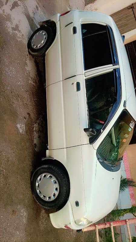 Daihatsu Cuore 2007 AC chill & 100% genuine inside outside 70% genuine 2