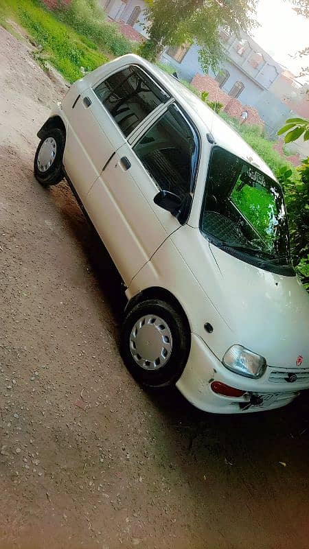 Daihatsu Cuore 2007 AC chill & 100% genuine inside outside 70% genuine 8