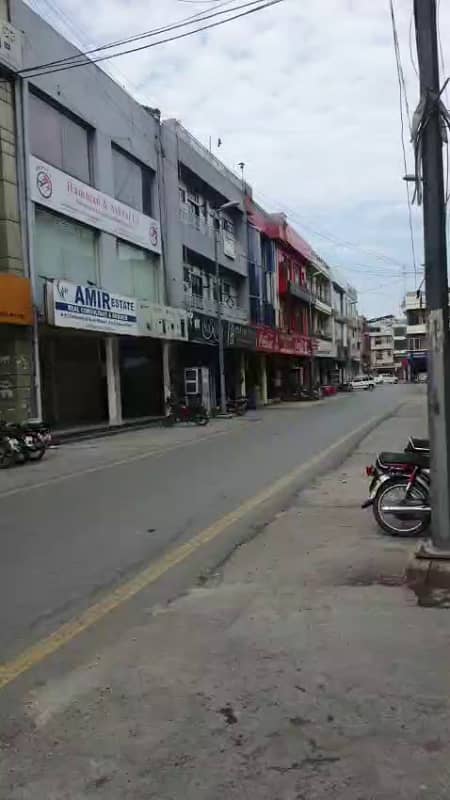 Facing Park Hot Location 4 Marla Rented Plaza for Sale in DHA Phase 2 Block T Lahore 1