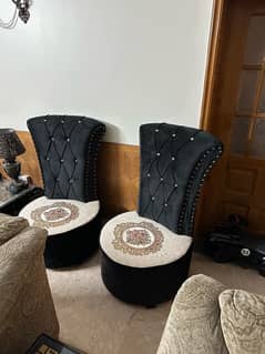 two long back room chairs