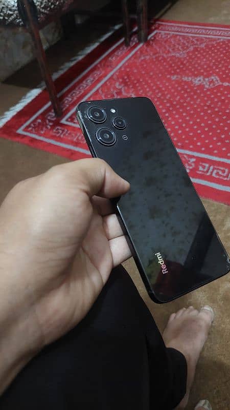 redmi 12 8/128 condition 9.5/10 with box charger pta approved 0