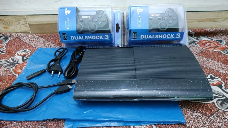 500gb ps3/48 games installed with tow controllers boxe pack 2