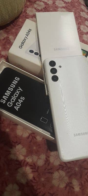 A04s used on minimum time. . with white body an with bright quality 5