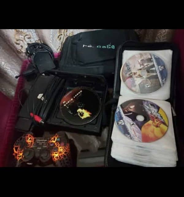 PS2 slim,29cds,origional case,custom controller 0