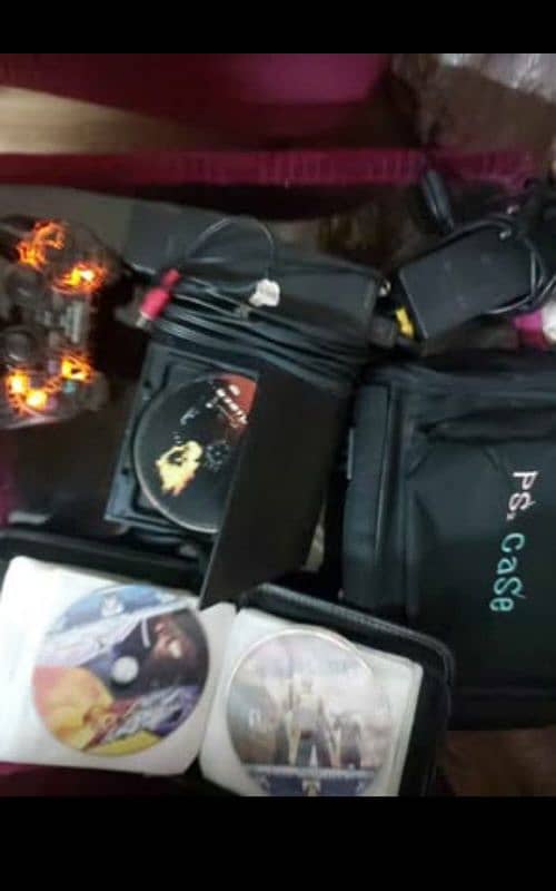 PS2 slim,29cds,origional case,custom controller 1