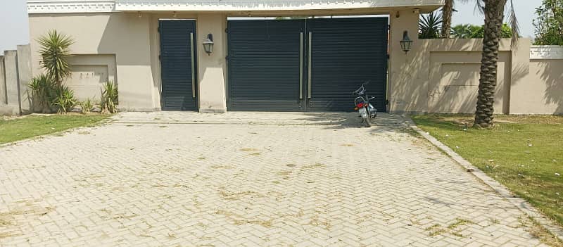 8 Kanal Fully Furnished Farmhouse for Sale on Main Barki Road with 3 Beds, Swimming Pool, 2 Kitchens, Servant Quarters, and Dual Gate Access 1