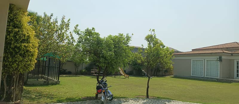 8 Kanal Fully Furnished Farmhouse for Sale on Main Barki Road with 3 Beds, Swimming Pool, 2 Kitchens, Servant Quarters, and Dual Gate Access 9