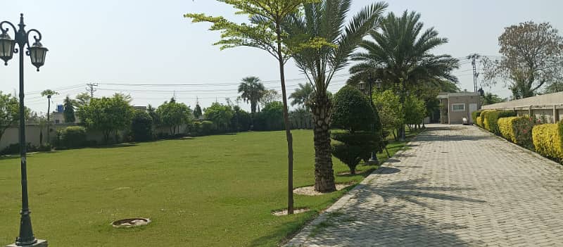 8 Kanal Fully Furnished Farmhouse for Sale on Main Barki Road with 3 Beds, Swimming Pool, 2 Kitchens, Servant Quarters, and Dual Gate Access 12