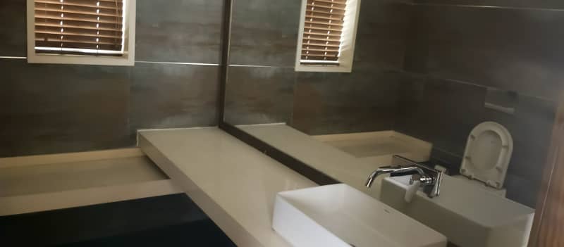 8 Kanal Fully Furnished Farmhouse for Sale on Main Barki Road with 3 Beds, Swimming Pool, 2 Kitchens, Servant Quarters, and Dual Gate Access 22