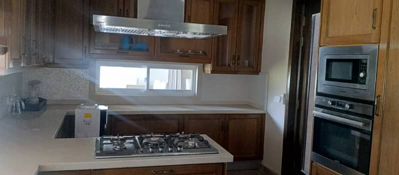 8 Kanal Fully Furnished Farmhouse for Sale on Main Barki Road with 3 Beds, Swimming Pool, 2 Kitchens, Servant Quarters, and Dual Gate Access 30