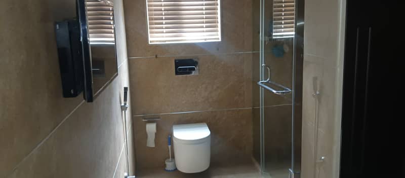 8 Kanal Fully Furnished Farmhouse for Sale on Main Barki Road with 3 Beds, Swimming Pool, 2 Kitchens, Servant Quarters, and Dual Gate Access 33