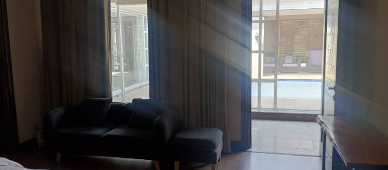 8 Kanal Fully Furnished Farmhouse for Sale on Main Barki Road with 3 Beds, Swimming Pool, 2 Kitchens, Servant Quarters, and Dual Gate Access 34