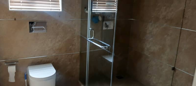 8 Kanal Fully Furnished Farmhouse for Sale on Main Barki Road with 3 Beds, Swimming Pool, 2 Kitchens, Servant Quarters, and Dual Gate Access 35