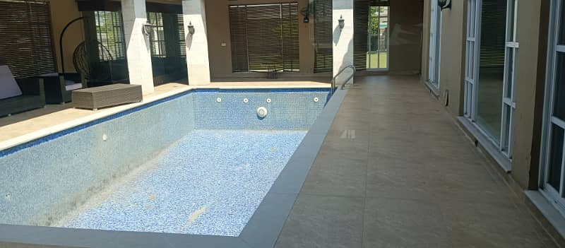 8 Kanal Fully Furnished Farmhouse for Sale on Main Barki Road with 3 Beds, Swimming Pool, 2 Kitchens, Servant Quarters, and Dual Gate Access 40
