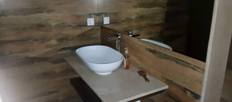 8 Kanal Fully Furnished Farmhouse for Sale on Main Barki Road with 3 Beds, Swimming Pool, 2 Kitchens, Servant Quarters, and Dual Gate Access 41