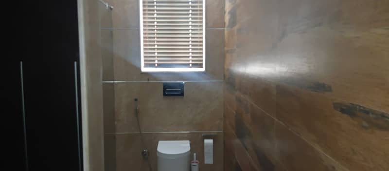 8 Kanal Fully Furnished Farmhouse for Sale on Main Barki Road with 3 Beds, Swimming Pool, 2 Kitchens, Servant Quarters, and Dual Gate Access 43