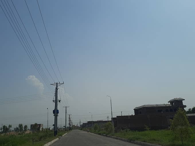 10 MARLA PLOT FOR SALE IN  ICON VALLEY  MARDAN ON MAIN DOUBLE ROAD 4